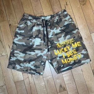 Camouflage Shorts with Yellow Text
